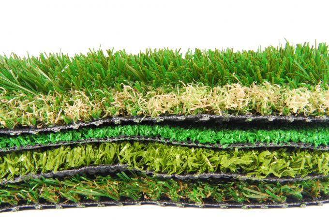 can you put artificial grass on top of real grass