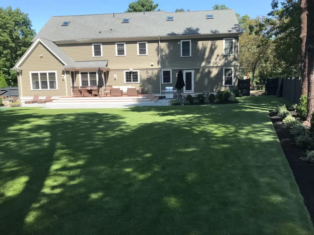 Backyard artificial turf installation 