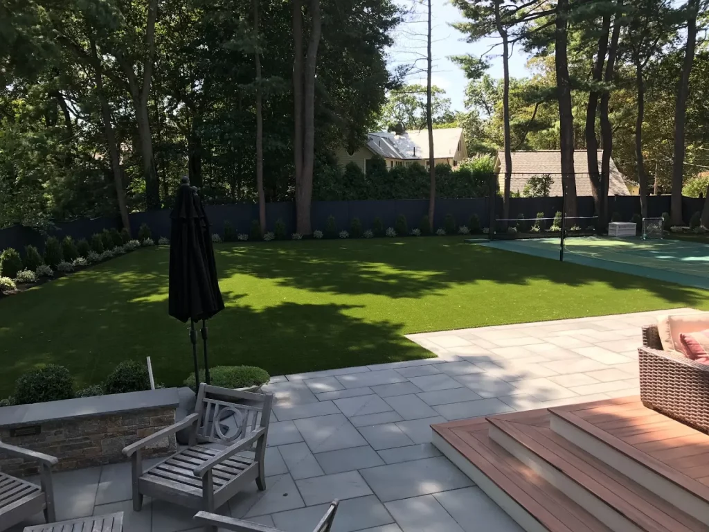 Backyard landscape design with artificial turf