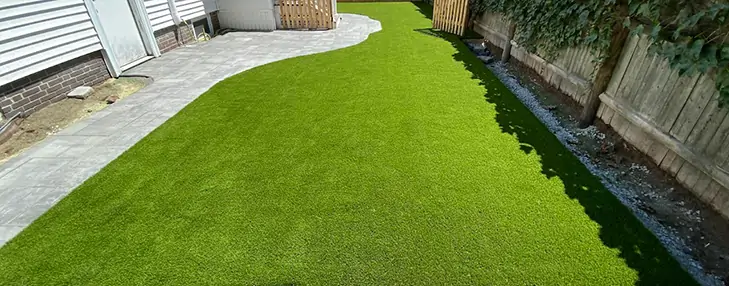 Artificial grass patio installation from New England Turf Store