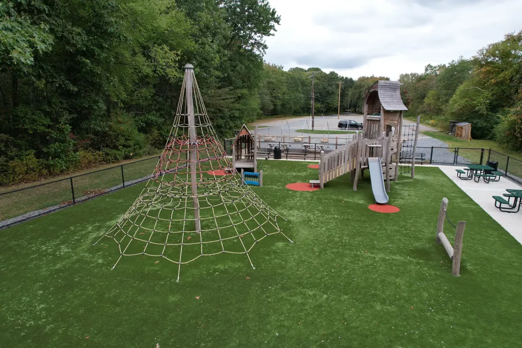 Artificial grass playground installation from New England Turf Store