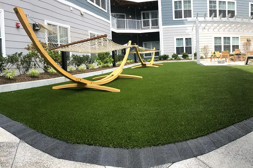 Apartment artificial grass lawn installation from New England Turf Store